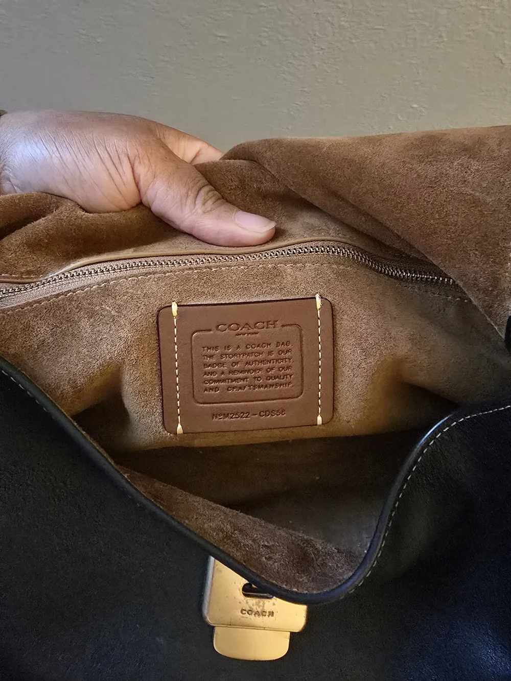 Coach sleek black